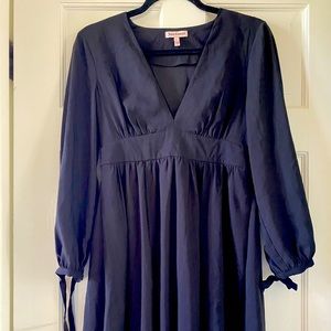 Short black dress with long sleeves